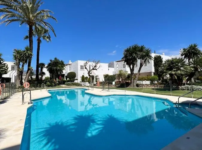 Impeccable Large Apartment With Immense Terrace And Private Garden Overlooking The Mountain, Featuring 2 Bedrooms And Sleeping Up To 4 Guests Located 100 Meters From Plaza Maestranza